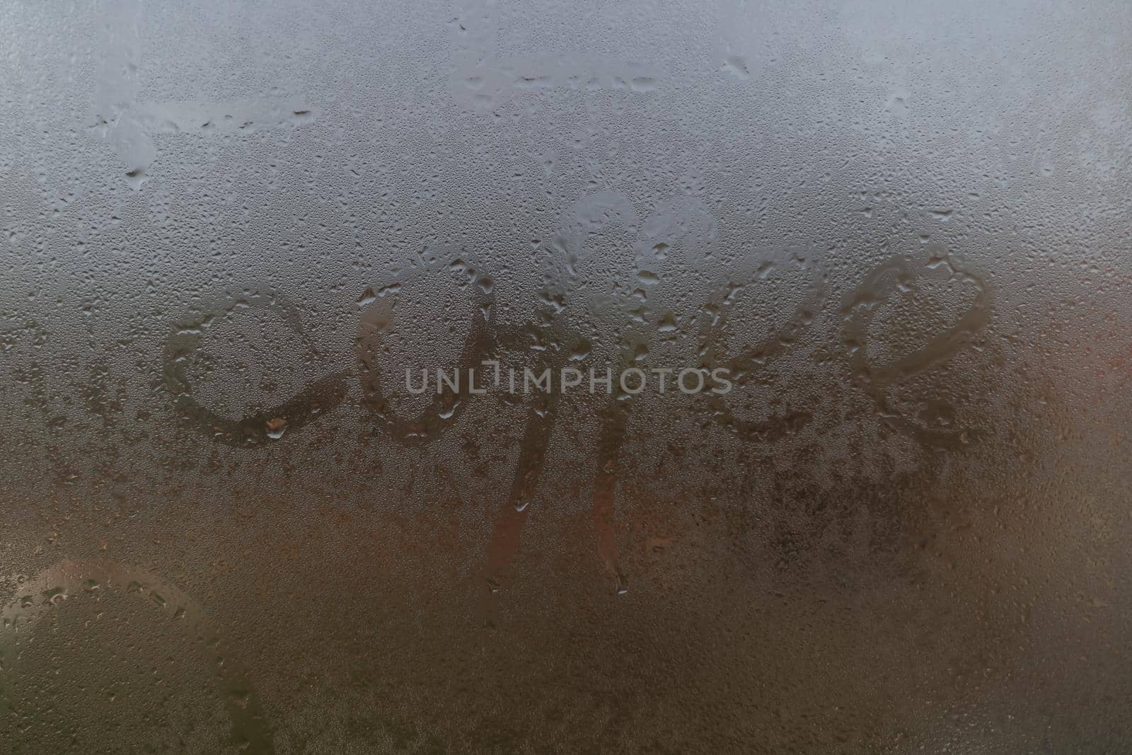 word coffee on a foggy window.