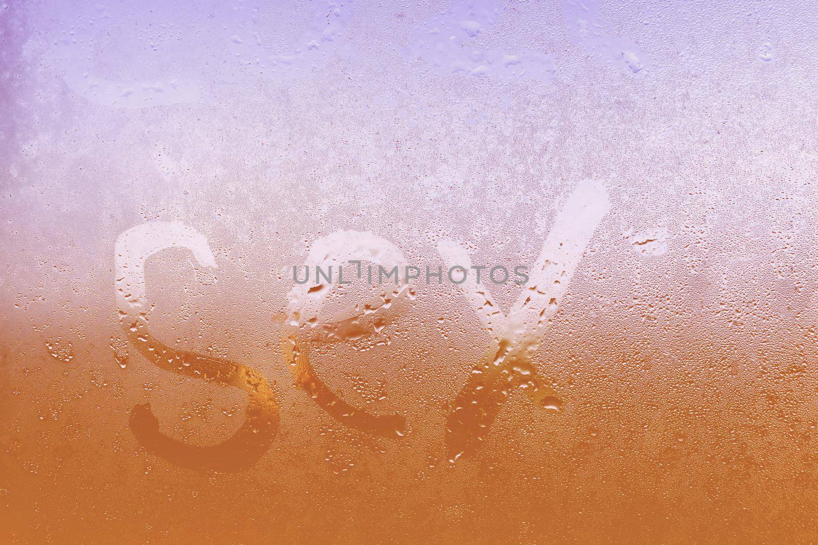 Sex inscription on the sweaty glass with drops dripping condensate. Concept photo of sex in the bathroom by Andelov13