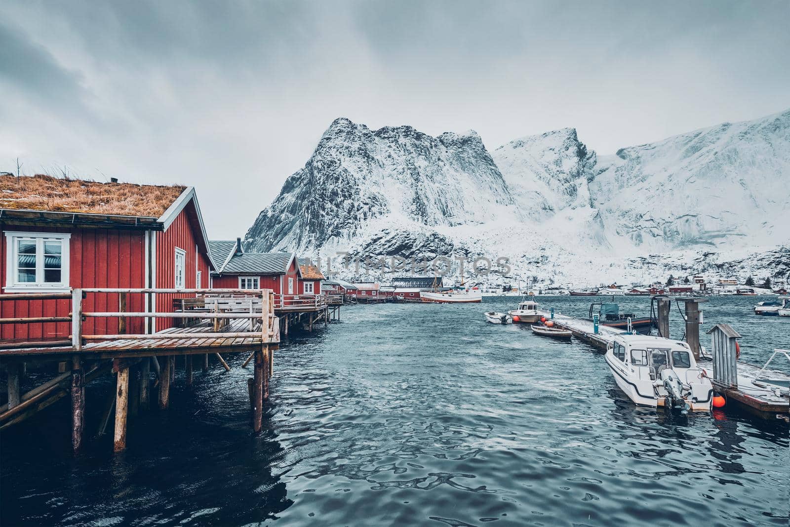 Traditional red rorbu houses in Reine, Norway by dimol