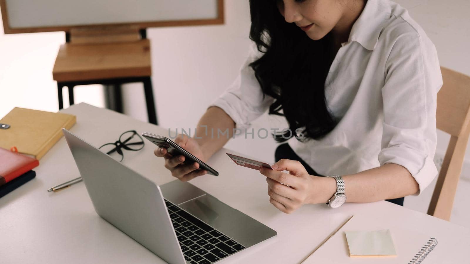 Close up hands holding credit card and using smart phone, Online shopping.