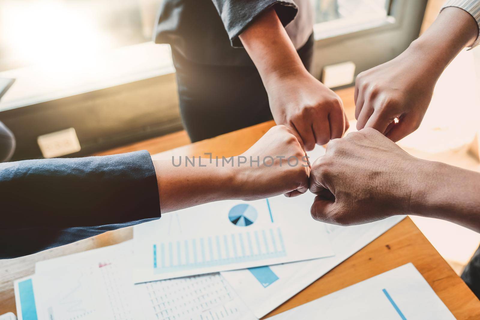 Teamwork Success. Business people group team happy showing teamwork and joining hands after meeting partner business in office. Business Concept