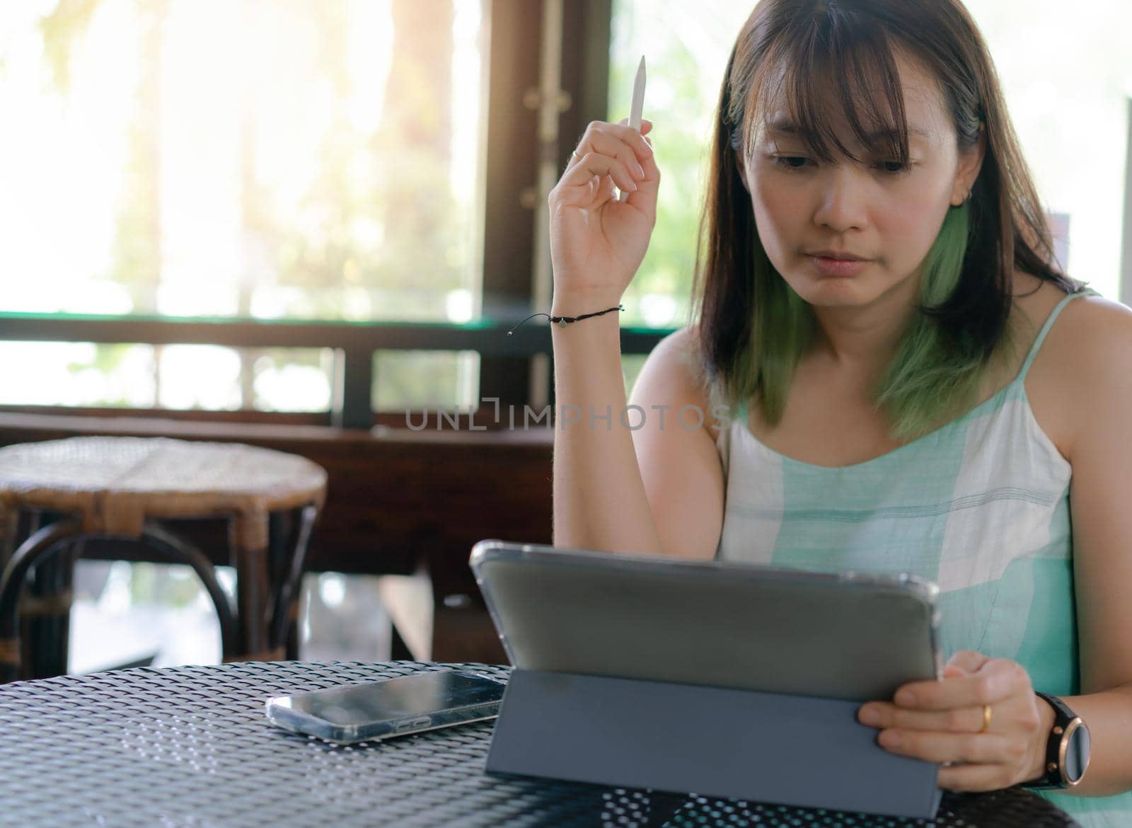 Woman use Tablet for working online business or work at home