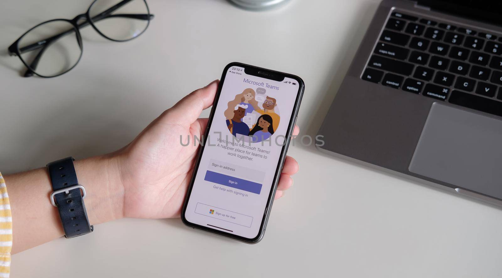 CHIANG MAI, THAILAND - JULY 3, 2020 : A working from home employee is downloading the Microsoft Teams social platform, ready for remote working in isolation from home