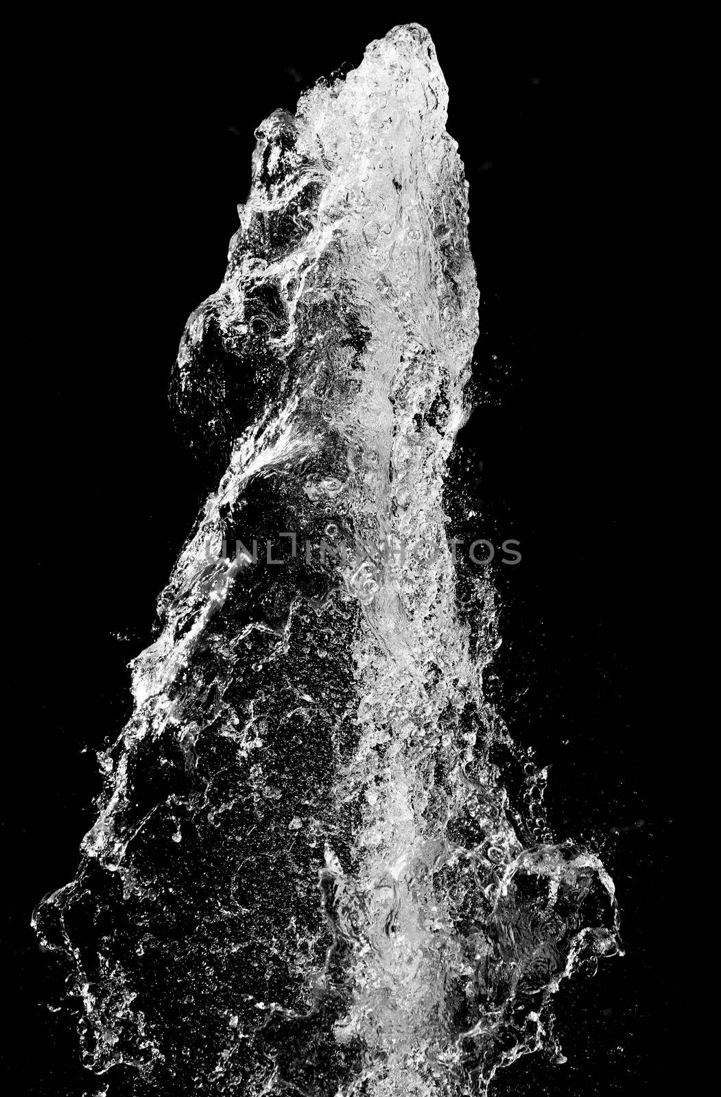 Splash of pouring water isolated over black background