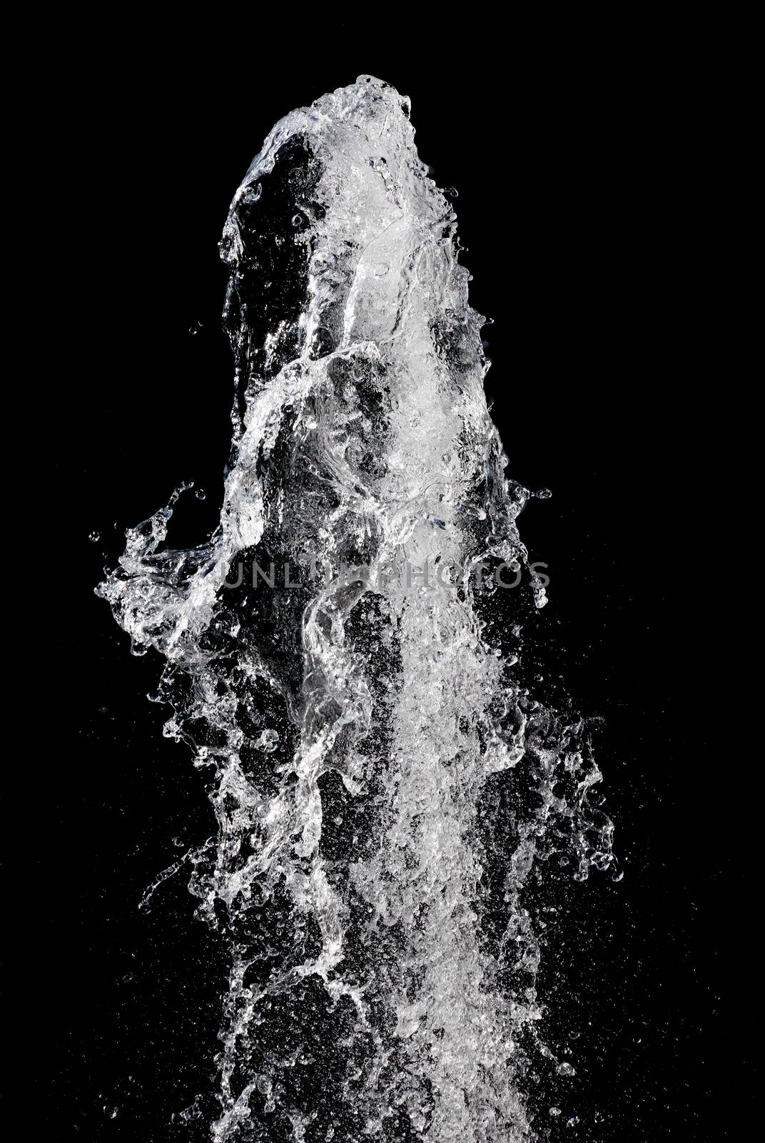 Splash of pouring water isolated over black background