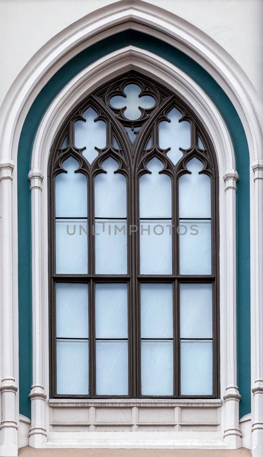 Ornamented window of a cathedral in gothic style