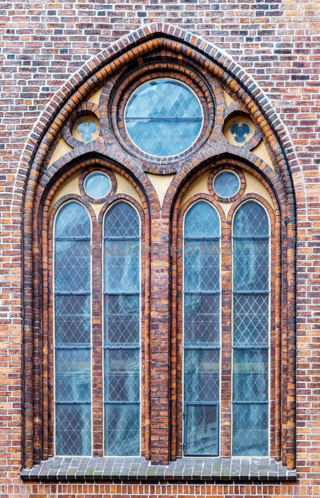 Ornamented window of a cathedral in gothic style