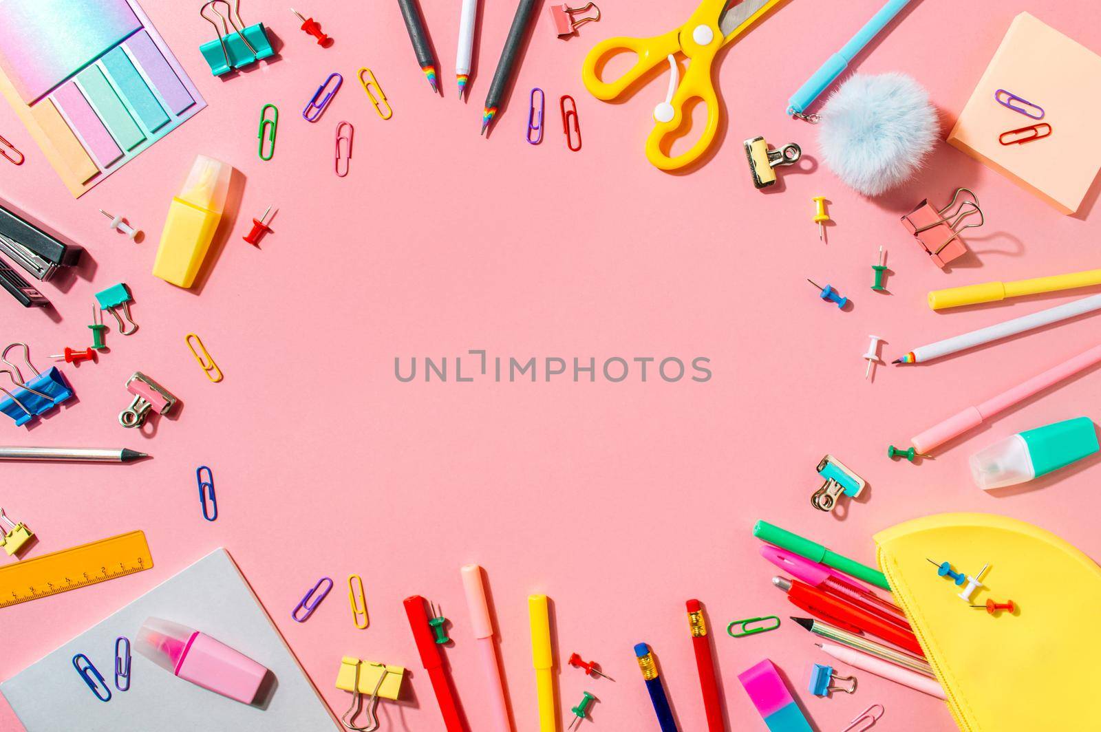 Back to school concept. Copy space. Pink bg by fascinadora