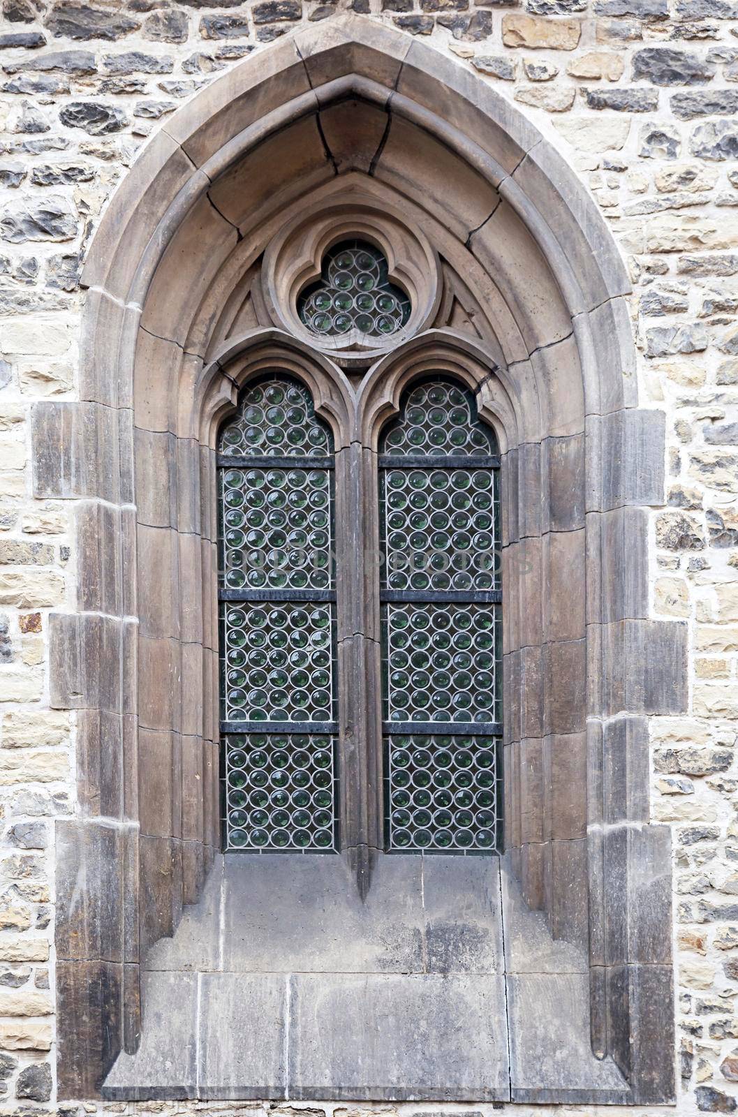 Ornamented window of a cathedral in gothic style