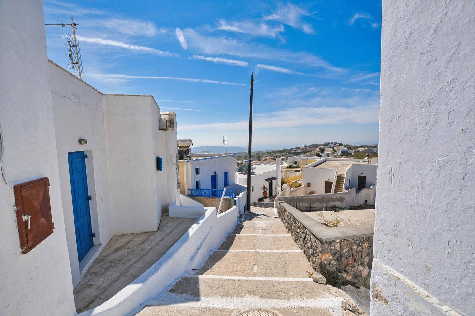 Pyrgos, Santorini, Greece. Famous attraction of white village with cobbled streets, Greek Cyclades Islands, Aegean Sea.