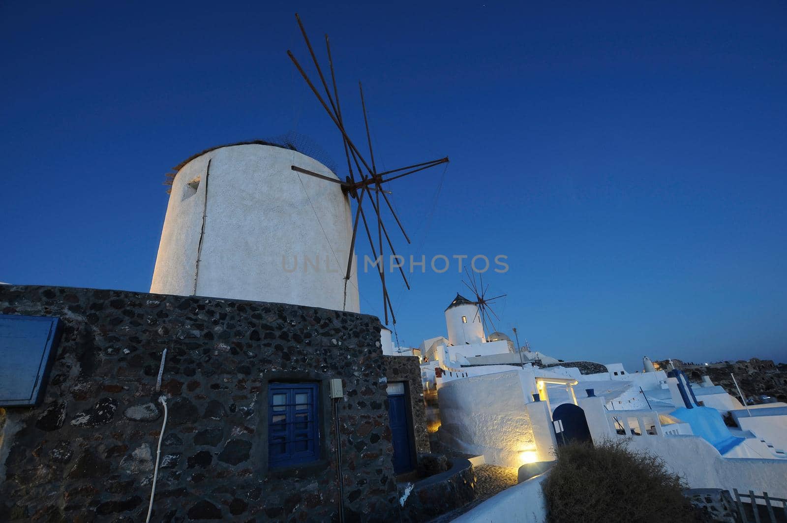 Beautiful village Oia in Santorini cyclades, at night by feelmytravel