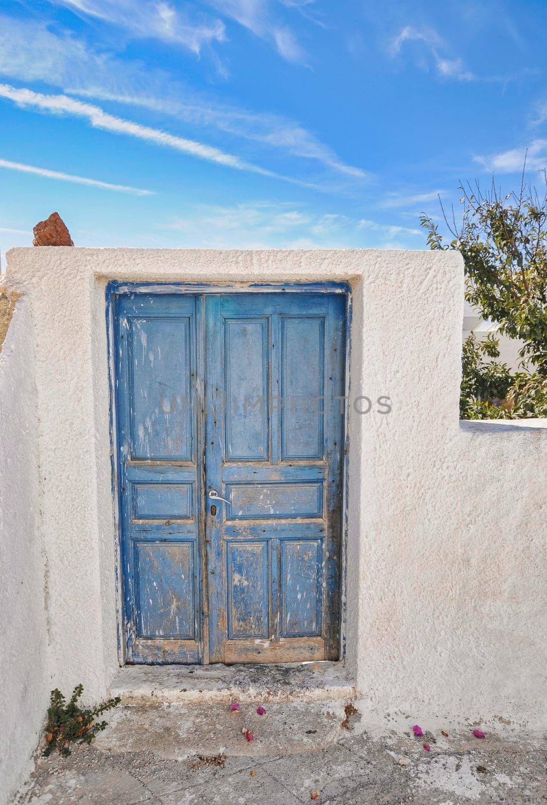 Old blue door in Pyrgos village of Santorini by feelmytravel