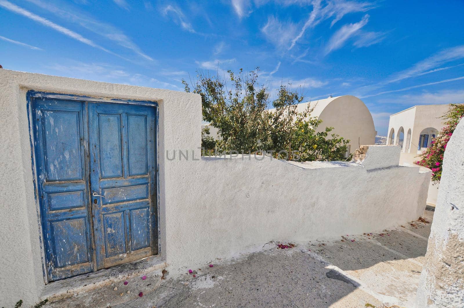 Old blue door in Pyrgos village of Santorini by feelmytravel