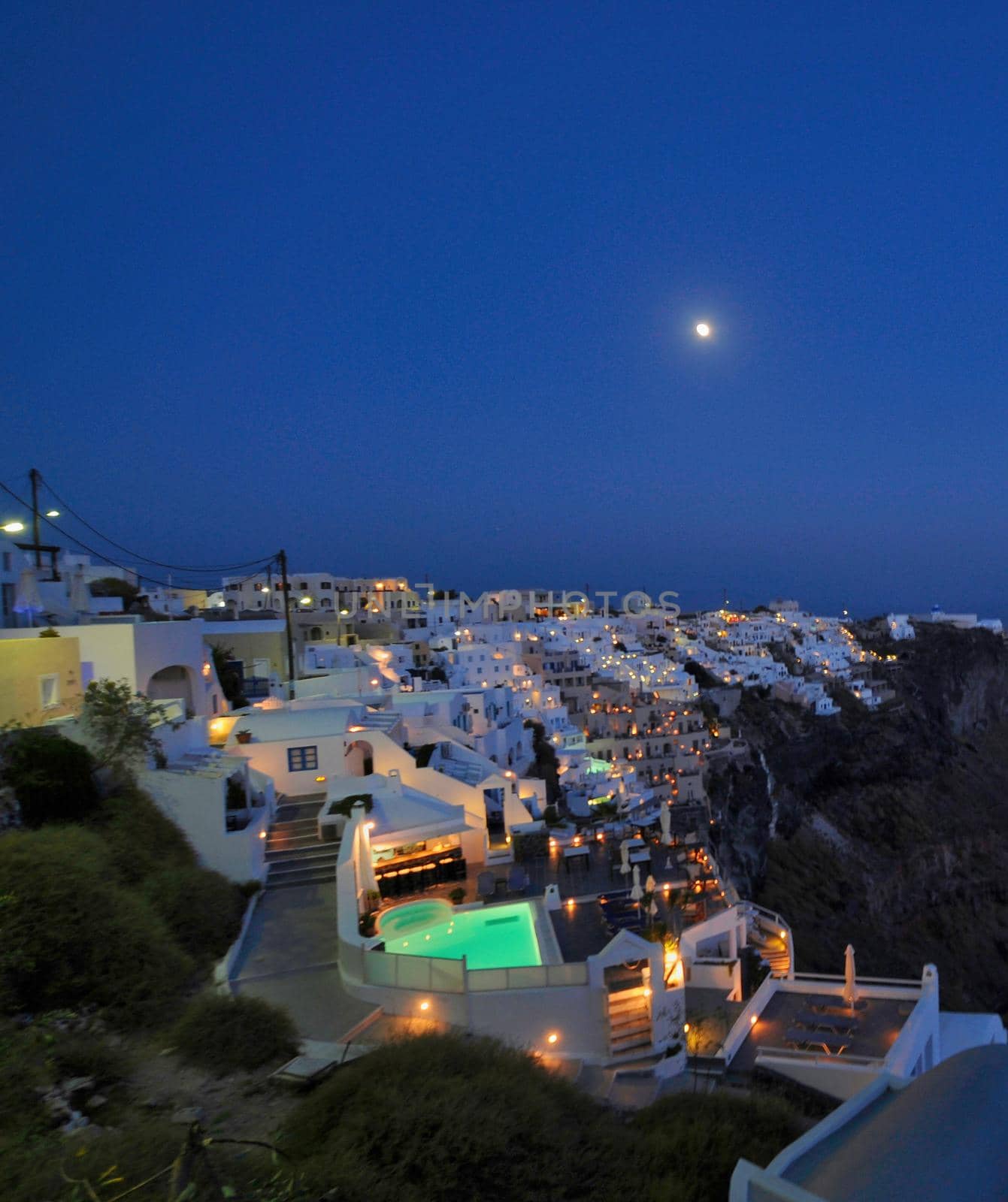 White architecture of Greek style apartments in Imerovigli village on Santorini island, Cyclades, Greece