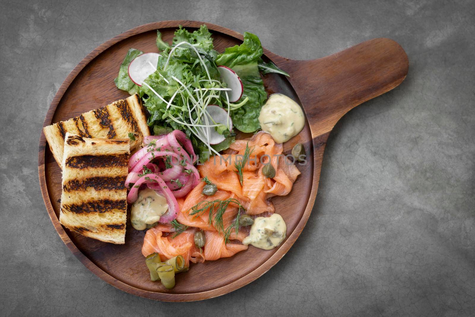 smoked salmon gourmet scandinavian food appetizer platter in sweden restaurant by jackmalipan