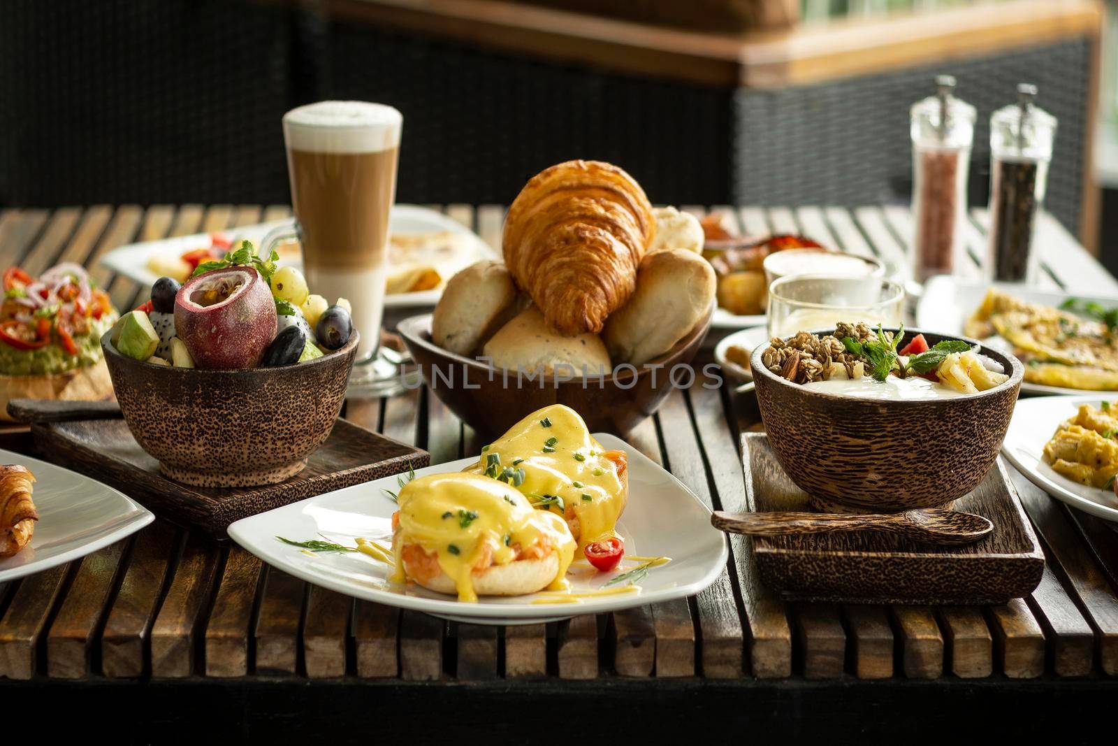Western big gourmet breakfast selection mixed dishes on restaurant table by jackmalipan