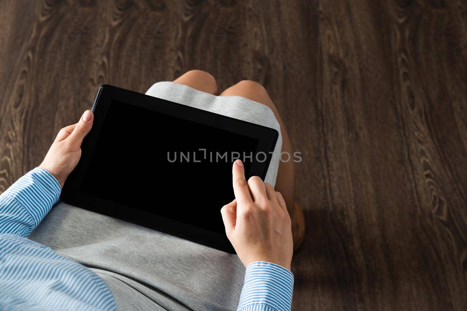 business woman with tablet on her lap by adam121