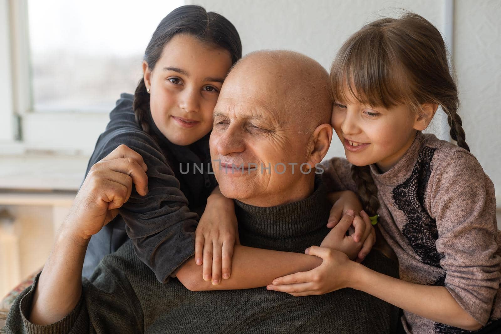 Family bonding. grandfather and child holding hands together, closeup view. Panorama by Andelov13