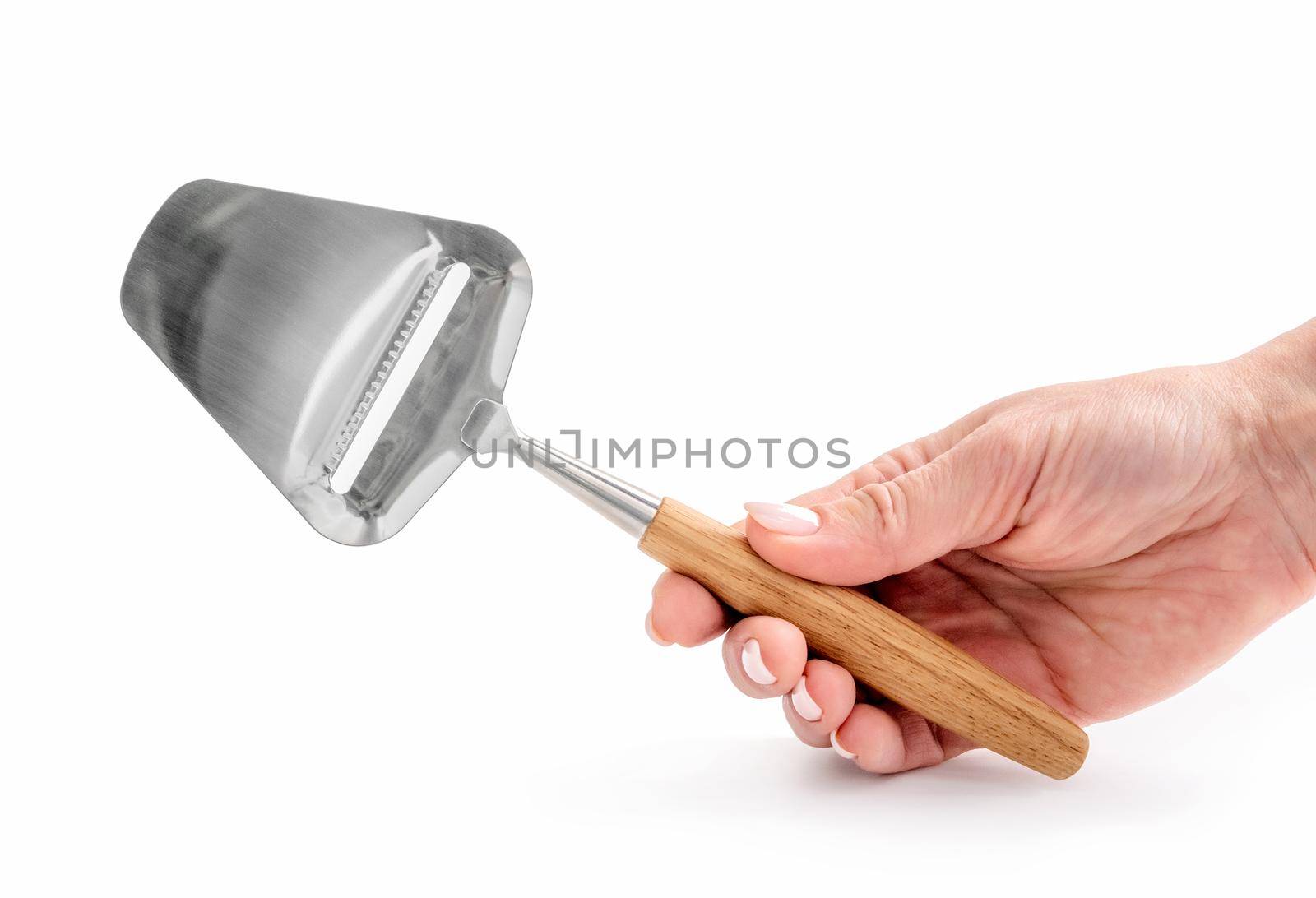 hand holding a hard cheese knife isolated on white background