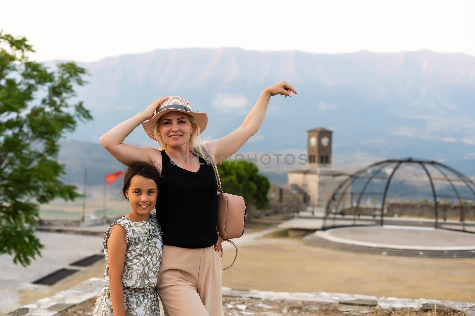 GJIROKASTER, ALBANIA. People enjoying the peaceful atmosphere in quarters of old city UNESCO World Heritage Site and popular tourist destination