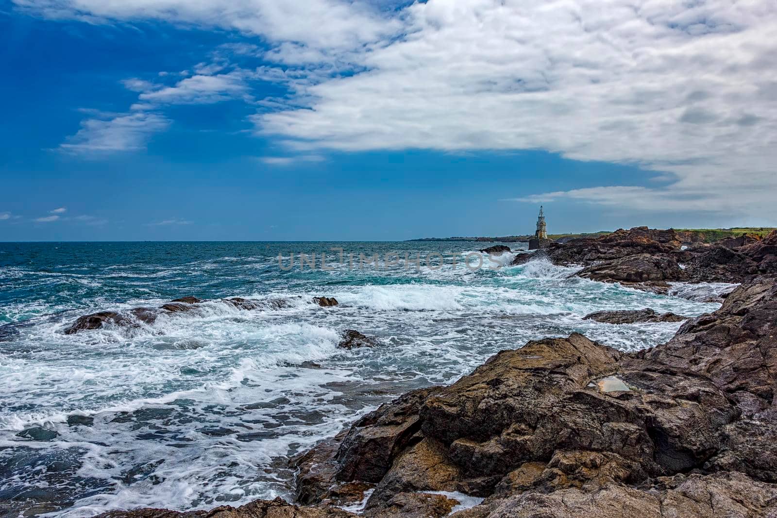 Scenic view at a lighthouse on the rocks. The Black Sea. Ahtopol. Bulgaria by EdVal