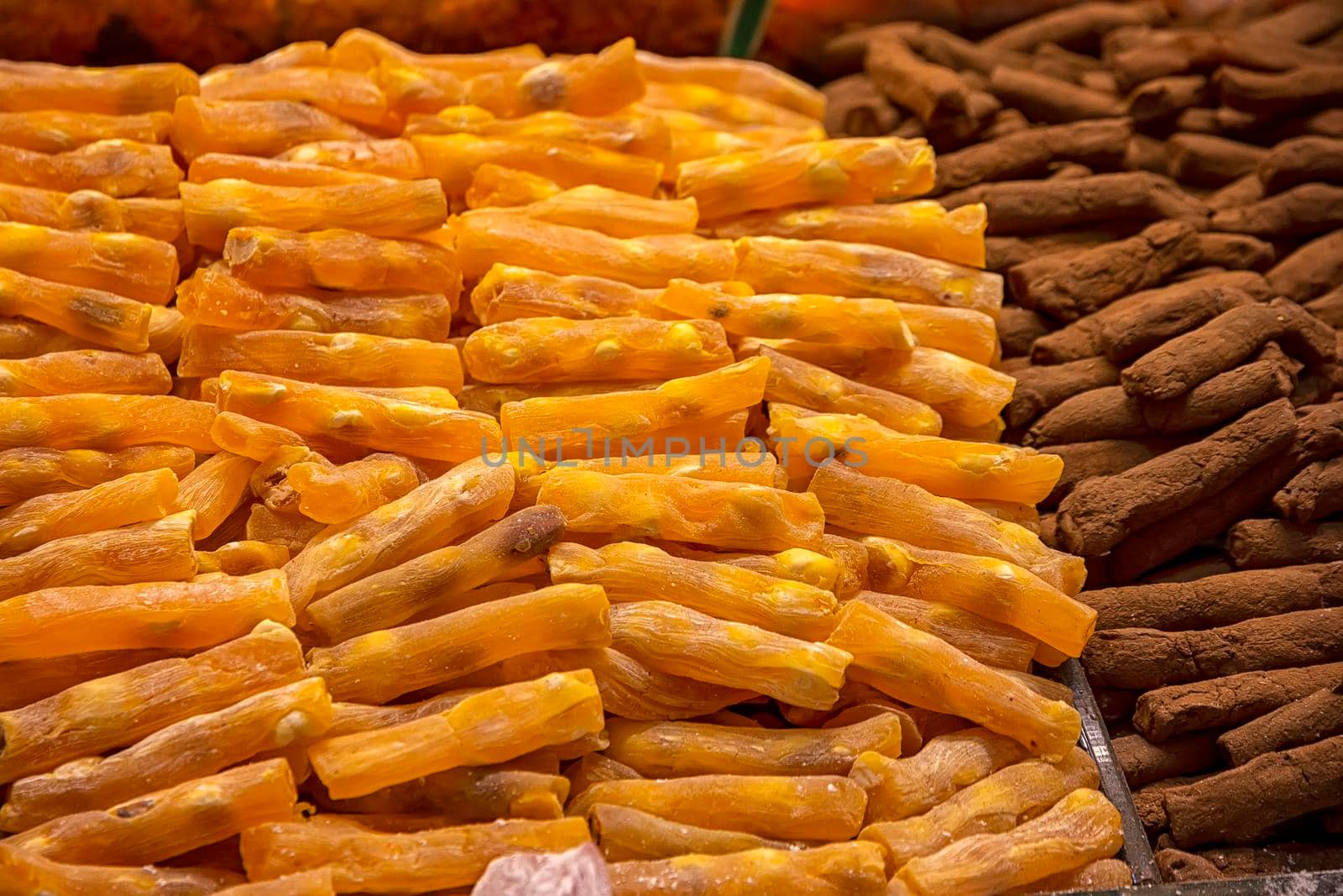 Close up of many sweets in the market. Horizontal view