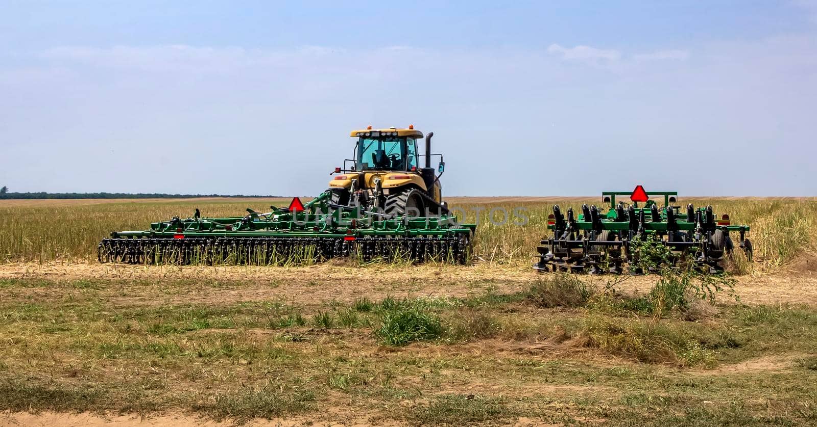 The machinery ready to prepare the ground for sowing and cultivation. Agriculture and agronomy concept.