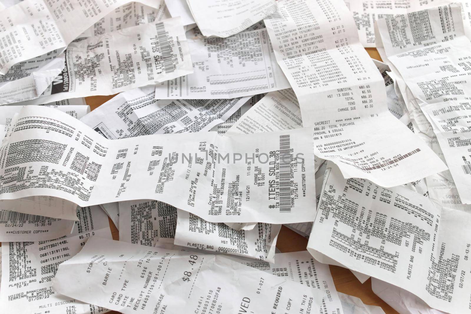 High Angle Full Frame Image of Receipts Ready for Accounting, Bookkeeping, Tax, Filing, Budgeting, or Record Keeping