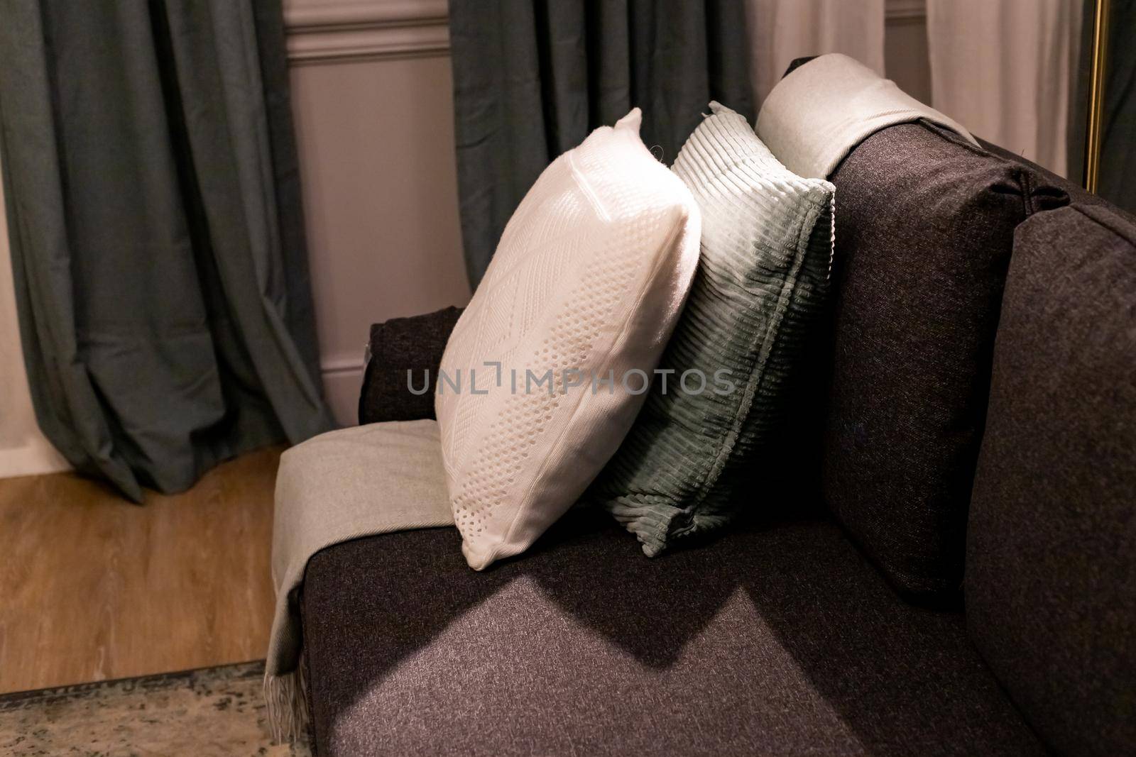 cozy set of pillows with pillowcases of different materials and textures textiles