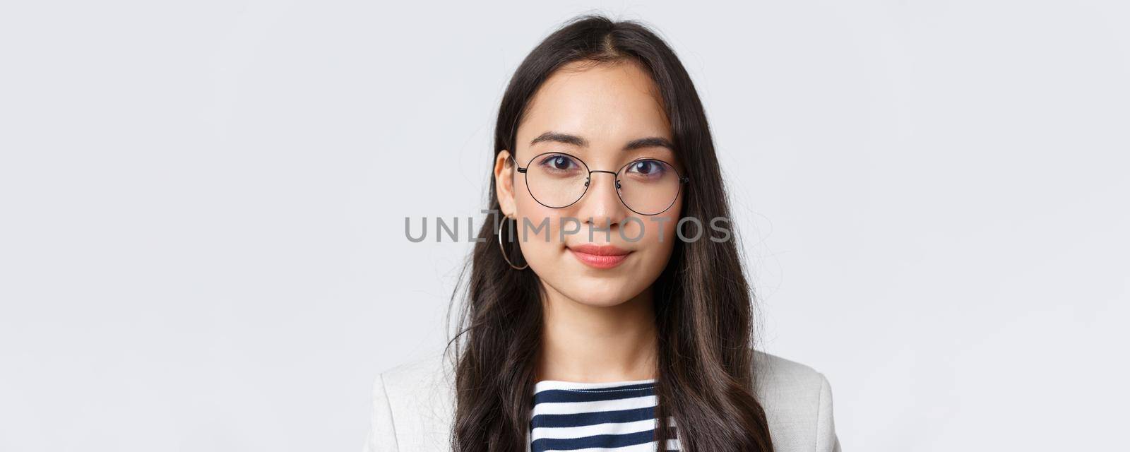 Business, finance and employment, female successful entrepreneurs concept. Close-up of modern stylish asian businesswoman in glasses looking confident and determined at camera.