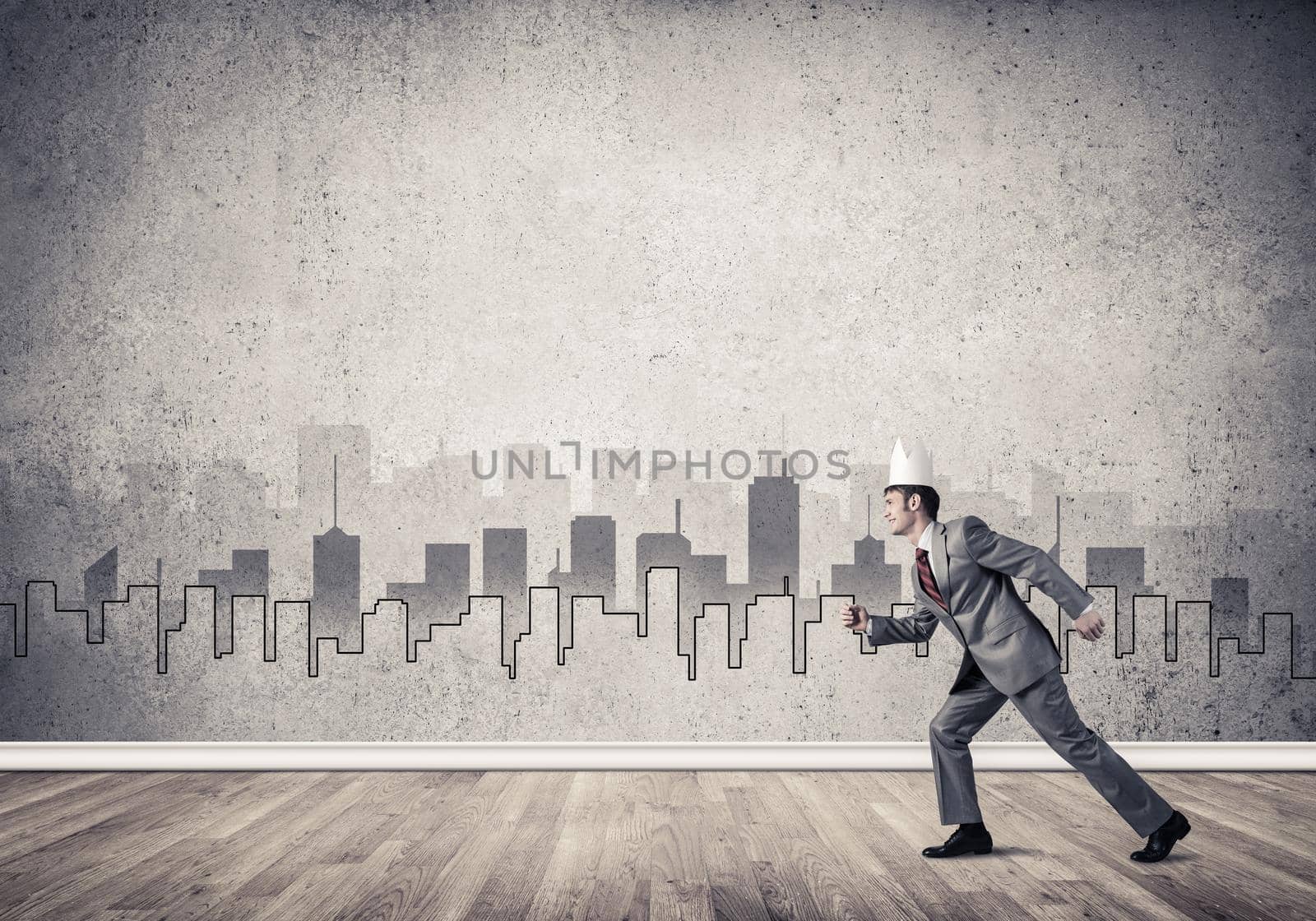 King businessman in elegant suit running and drawn cityscape silhouette at background by adam121