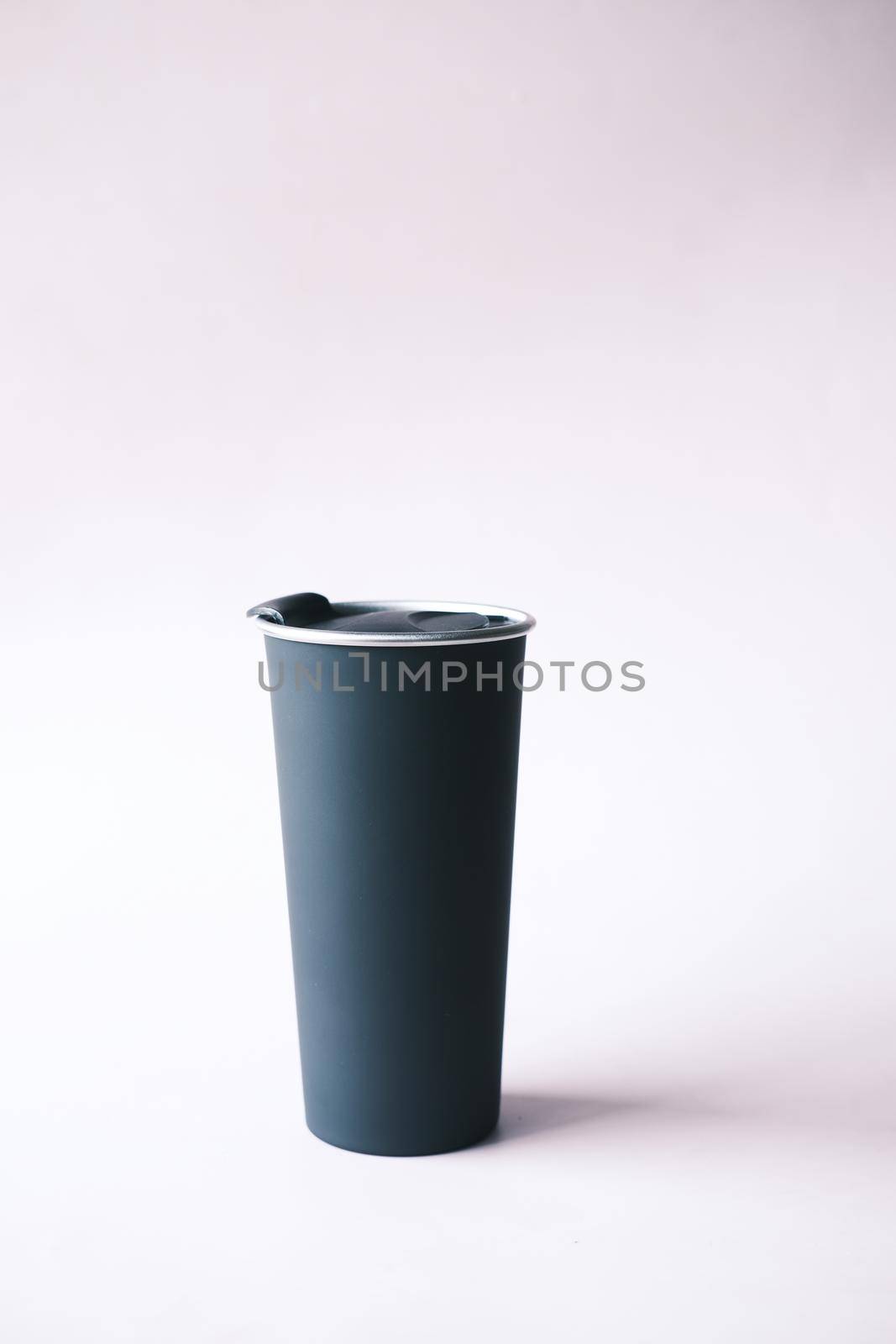 black color reusable eco coffee cup on table with copy space. by towfiq007