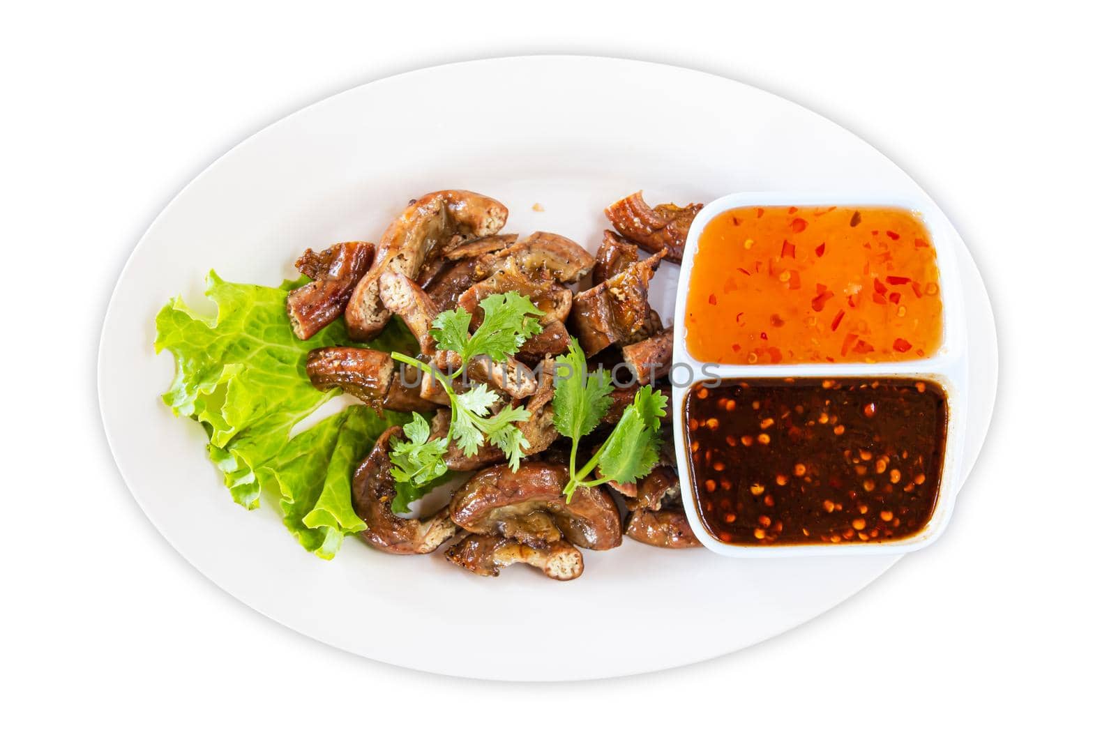 Pig's intestines grilled with sauce thai style food in dish on white background