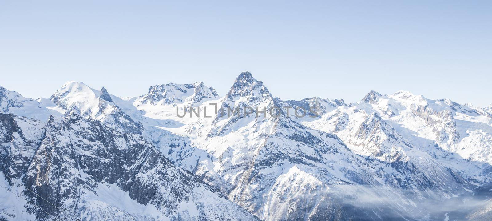 Mauntain glacier panoramic snow top panoramic view with blue sky