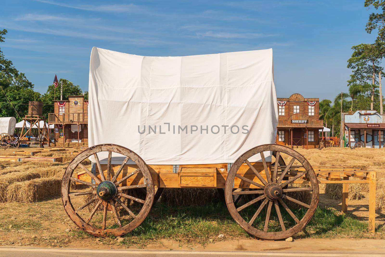 Antique covered wagon in the old west city