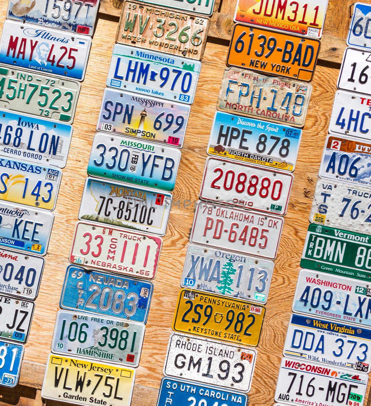 KANAB, UTAH, USA - MAY 25, 2015: License Plates Collage in public place on a street in Kanab Utah USA by Mariakray