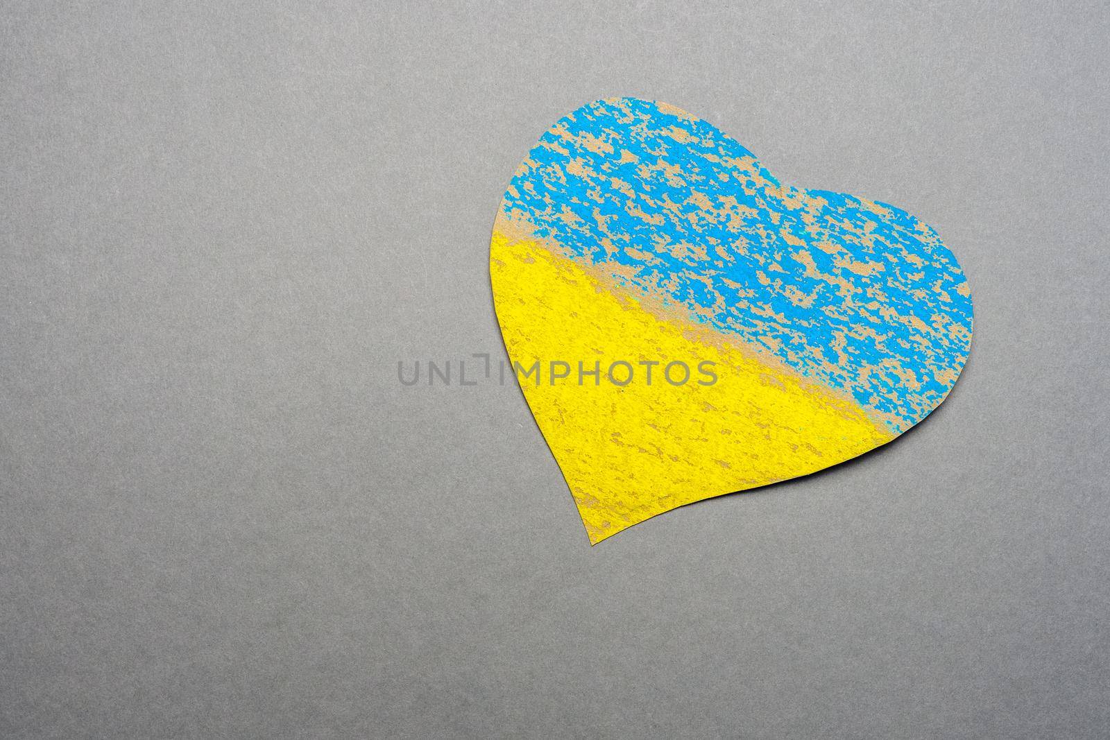 No war kids making symbol heart Ukraine flag painted yellow blue. National symbol ukraine painted child drawing heart isolated on gray background. Save Ukraine sign support concept heart shape love UA by synel