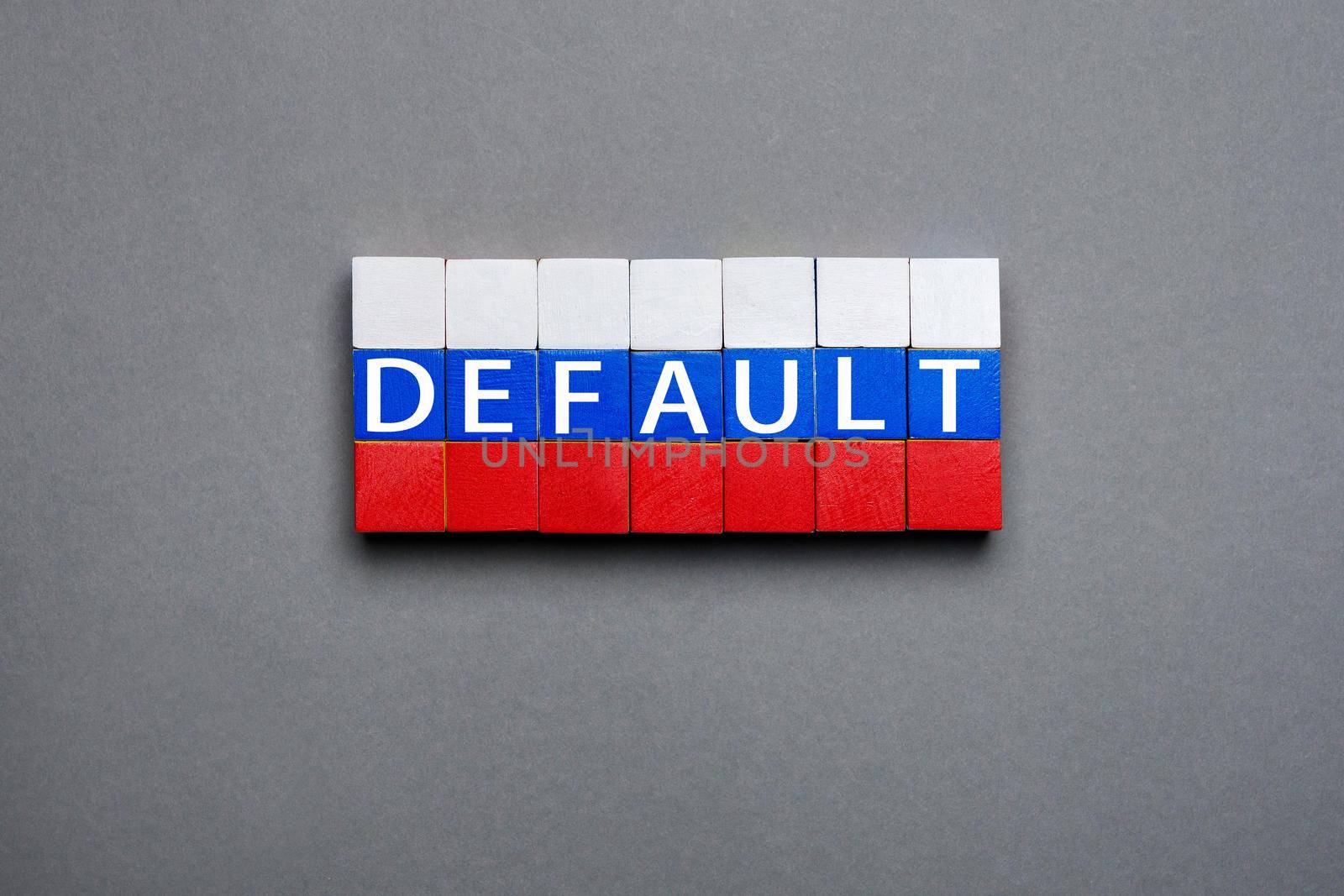 Wooden cubes text concept default blocks stack Russian federation crisis. Cubes default text isolated flag of Russia concept. Made of block letters wood word default in Russian flag cubes stacked sign by synel