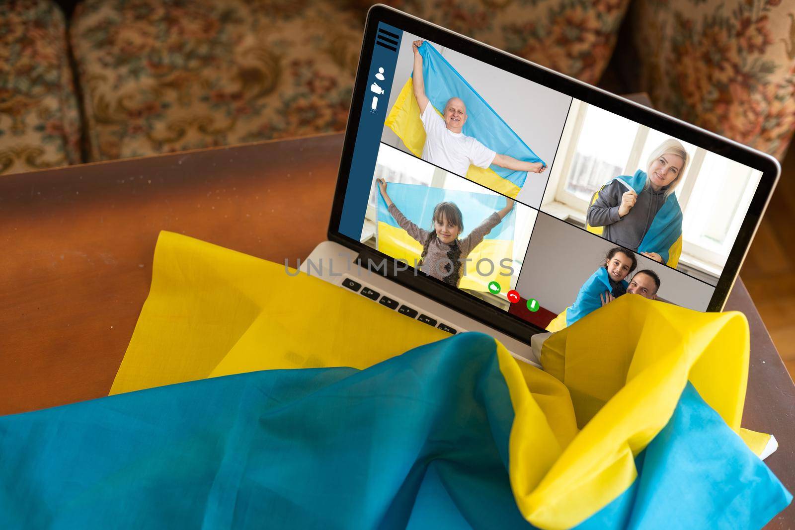 laptop near the ukraine flag. online conference by Andelov13