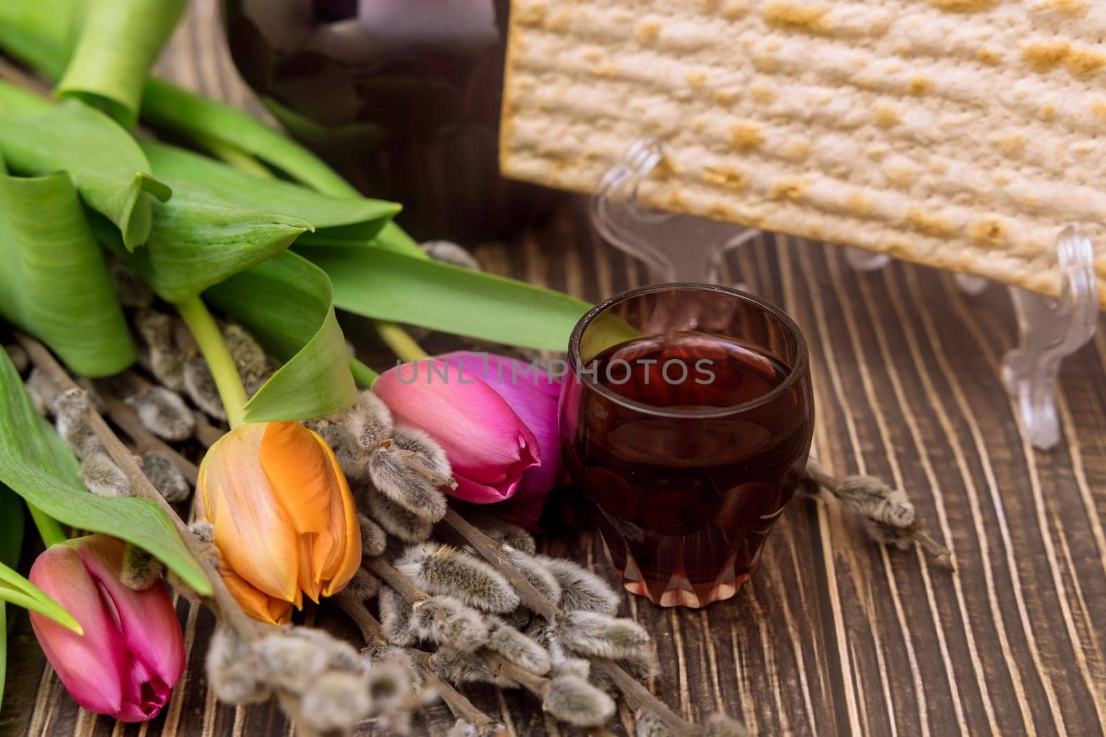 Jewish traditional the ceremony ritual for Passover holiday celebration of kosher wine cup and matzah bread on Pesach Blessings
