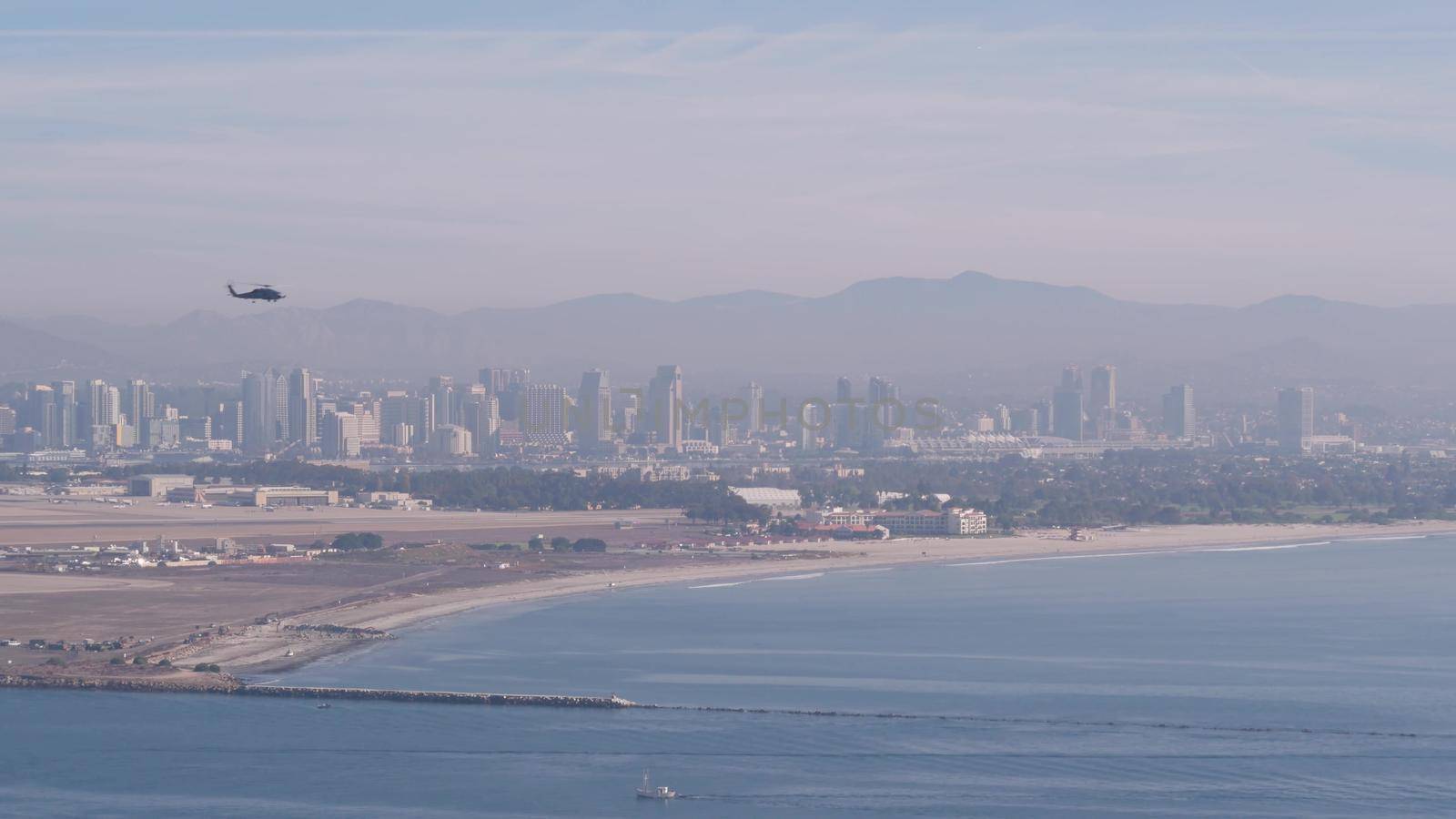 San Diego city skyline, cityscape of downtown, California Point Loma. Helicopter by DogoraSun