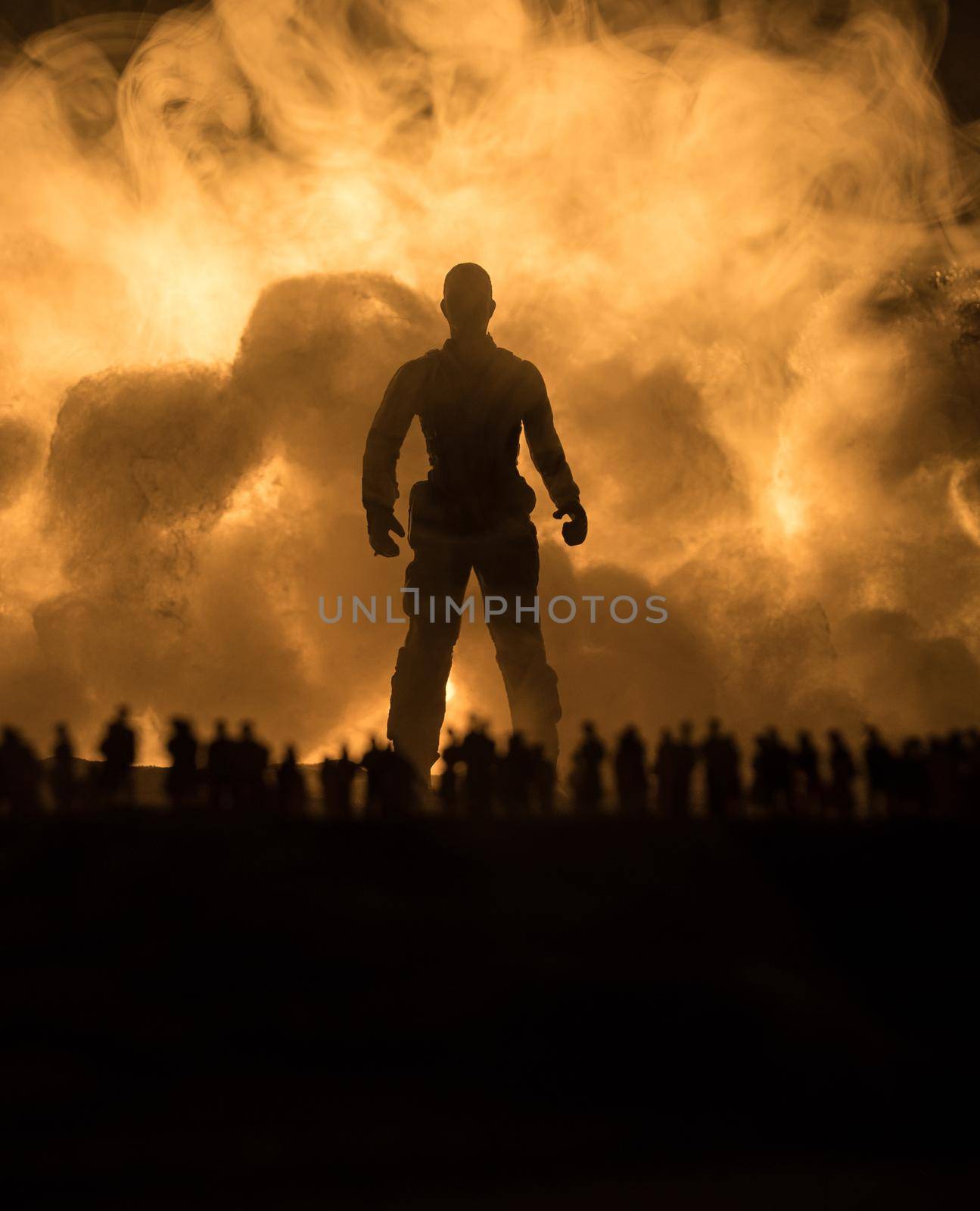 Creative artwork decoration - Russian war in Ukraine concept. Crowd looking on giant explosion and silhouette of giant person. Selective focus