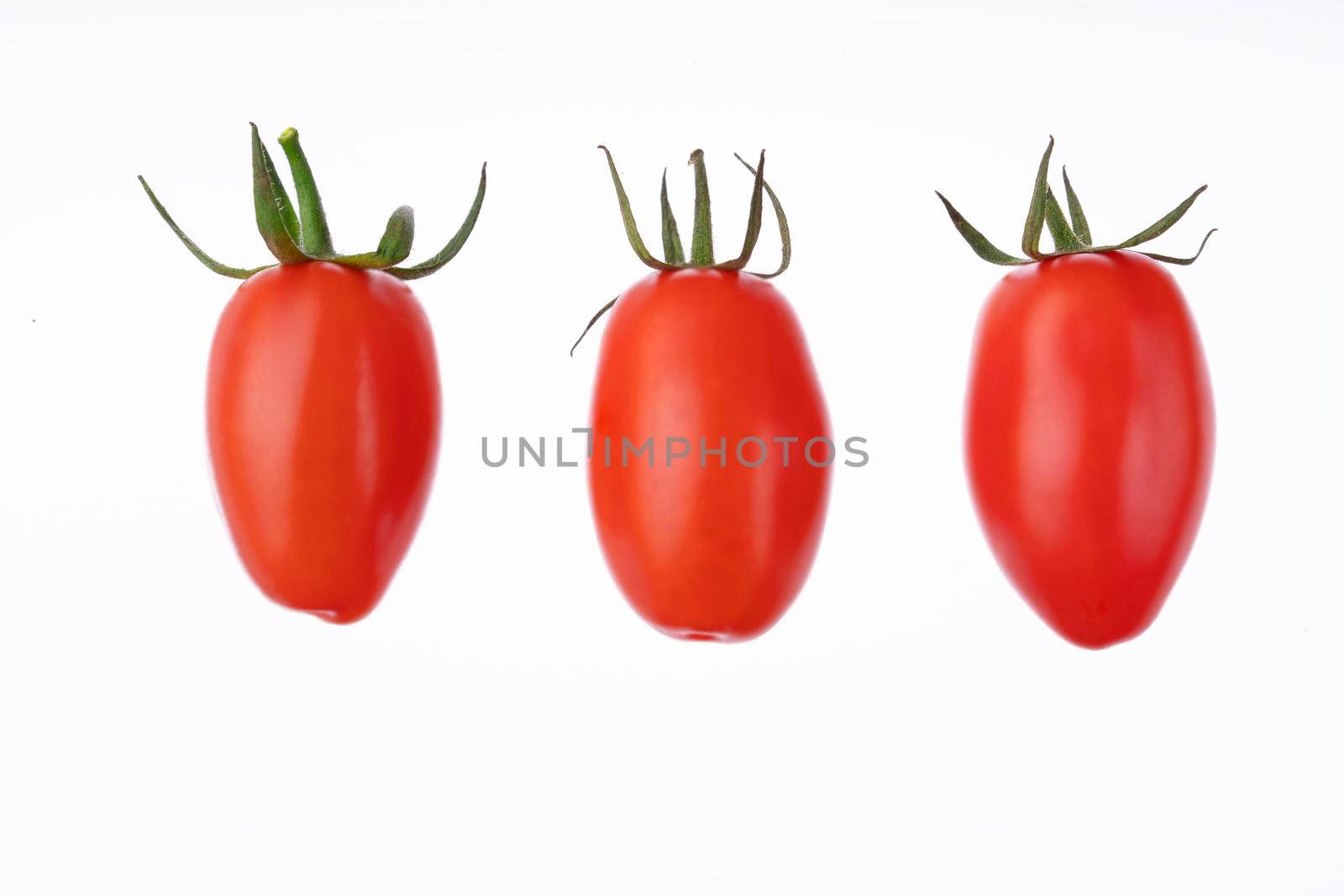 Plum cherry juicy tomatoes isolated on white. Set of italian fresh vegetables. Group of San Marzano tomato. Organic raw vegan healthy food vegetable. Farm market product. Top view, macro, above.