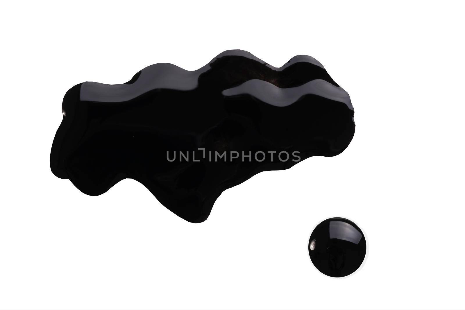 Blot of nai lpolish. Spilled black nailpolish isolated on white. Woman cosmetic fashion product. by photolime