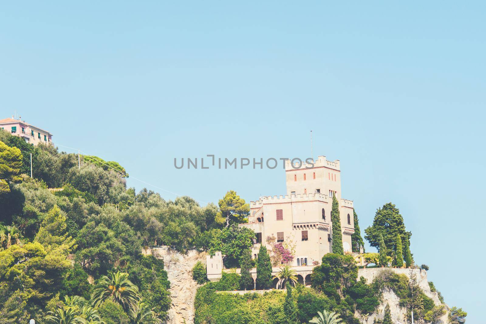 View on castle on top of the mountain in italian coastline by photolime