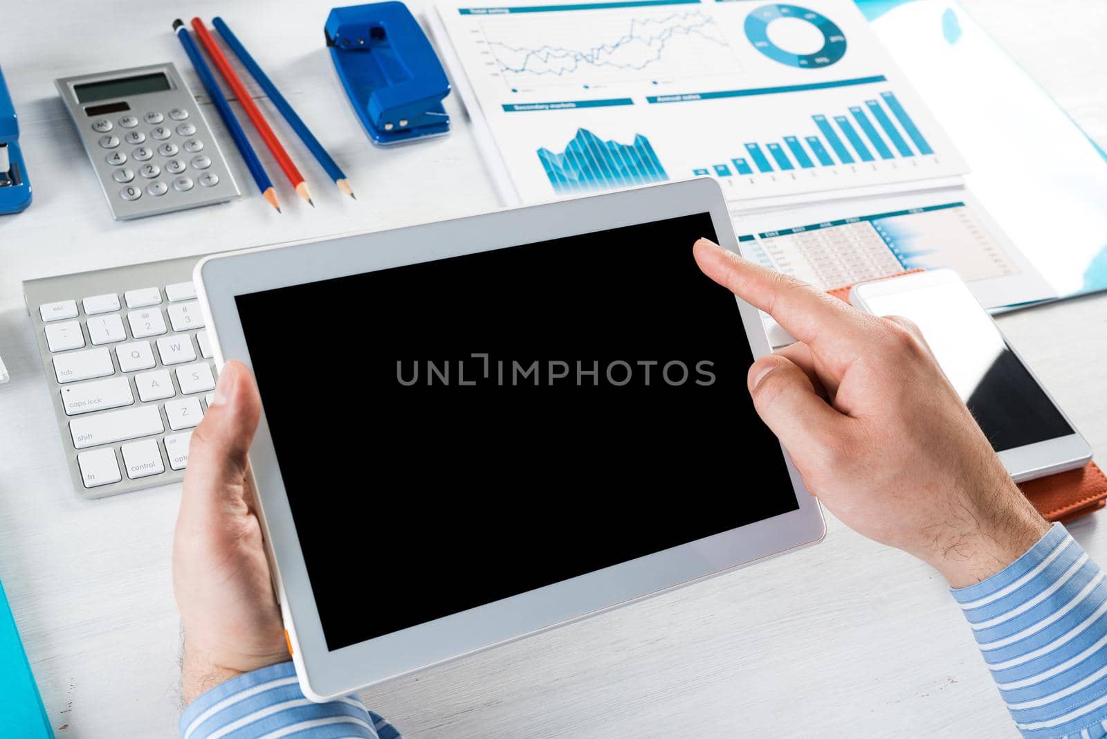 businessman with a tablet, works in the office by adam121