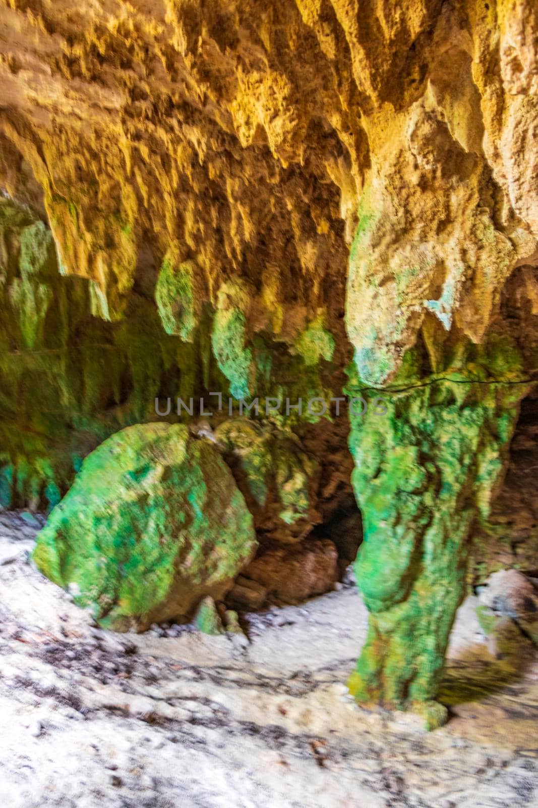 Amazing blue turquoise water and limestone cave sinkhole cenote Mexico. by Arkadij