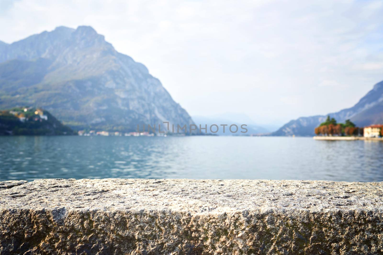 Showcase, podium for cosmetic products and blurred mountain lake landscape in background. Nature pedestal for products. .