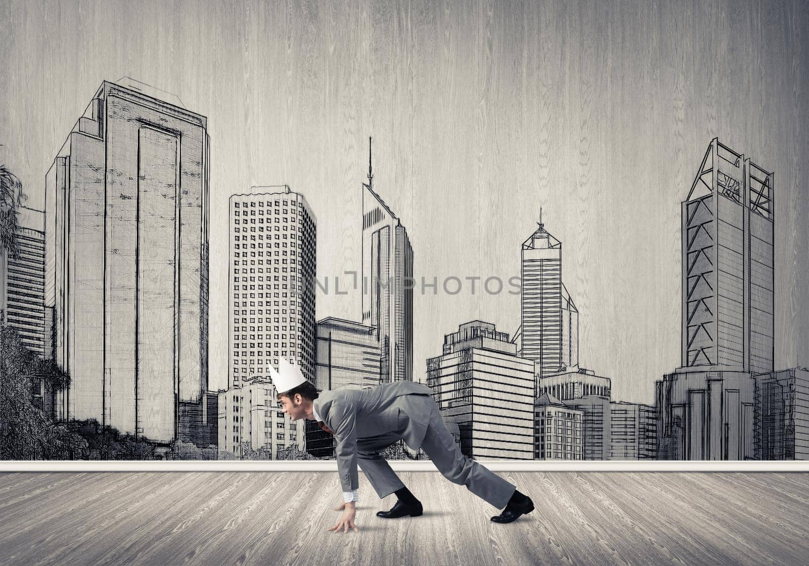 Young handsome businessman wearing white paper crown running in a hurry