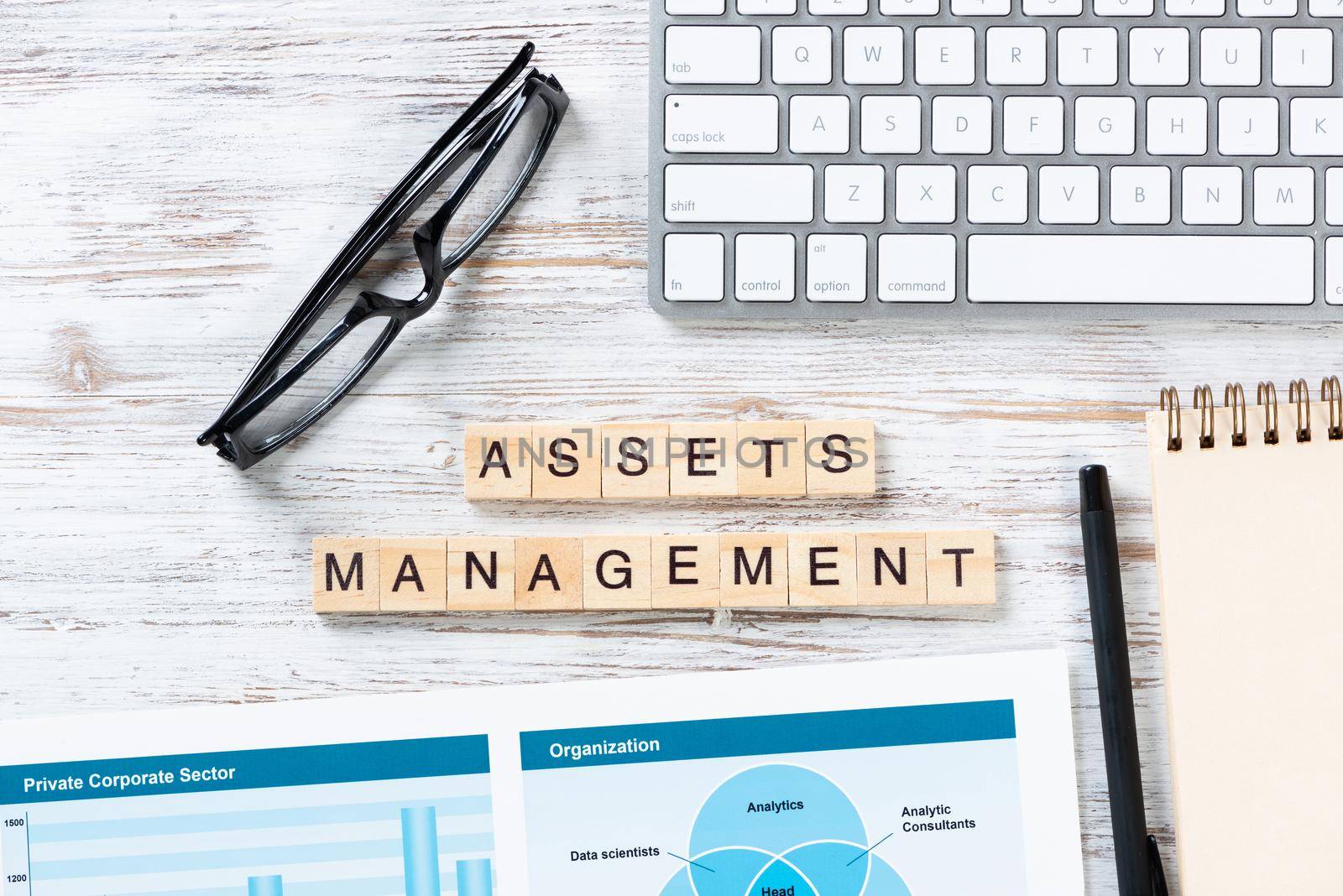 Asset management concept with letters on cubes by adam121